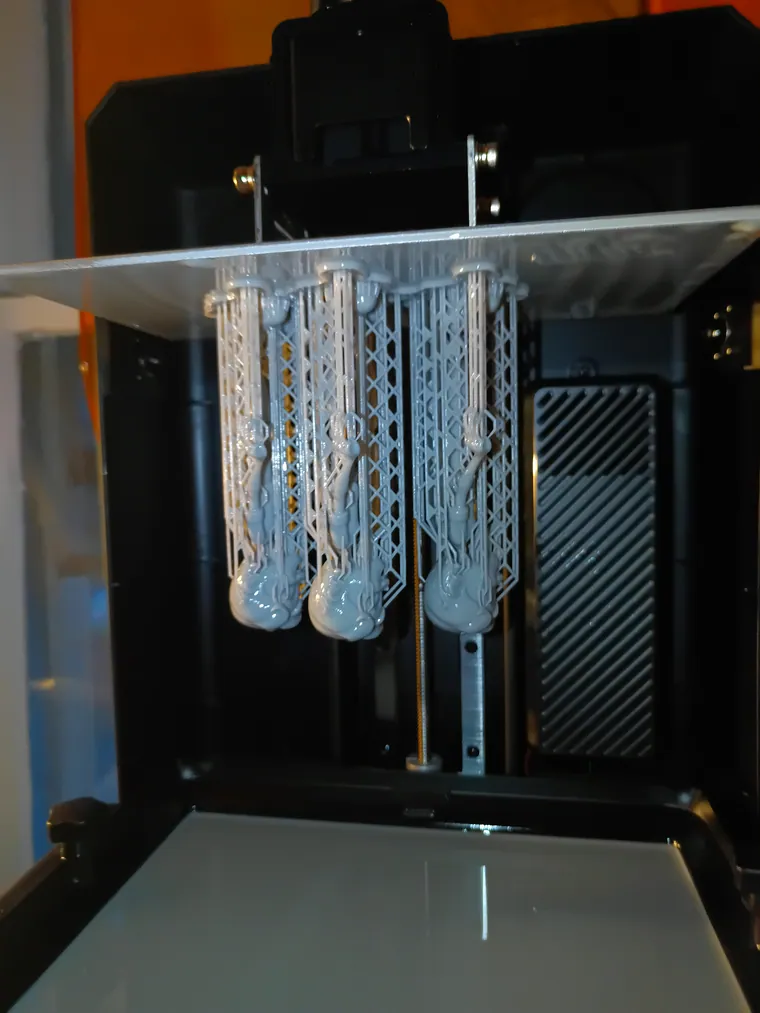 Parts on the printer part way through a run.
