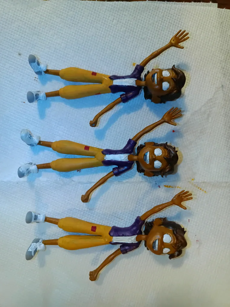 Articulated figures drying after painting.