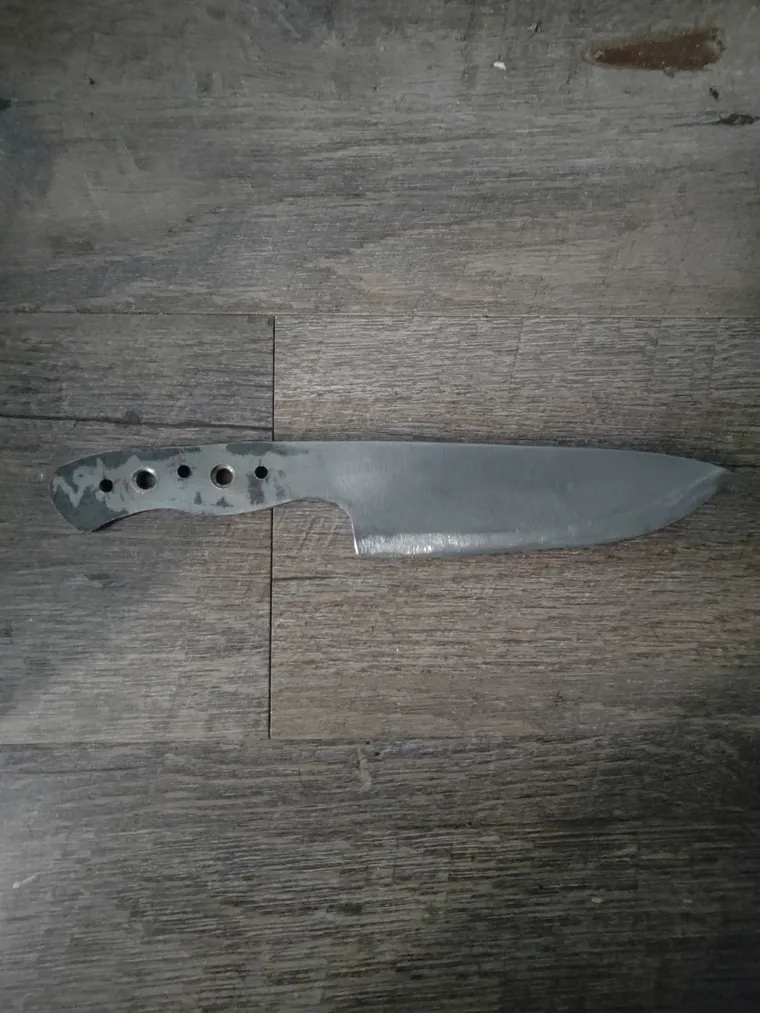 Knife blank cut and drilled.