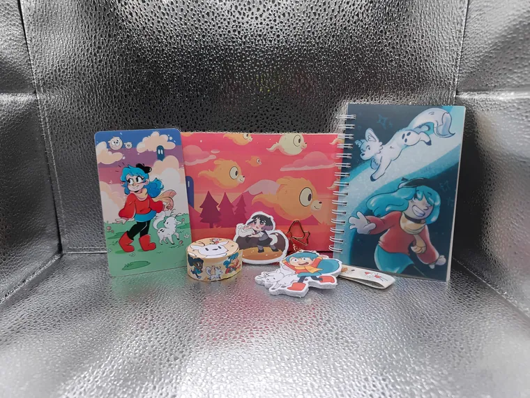 Box contents: notebooks, washi tape, standee, bookmark and charms.