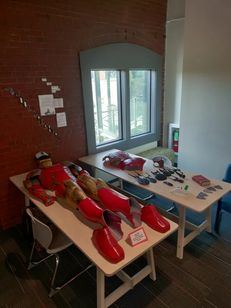 Parts spread across two tables during the build.