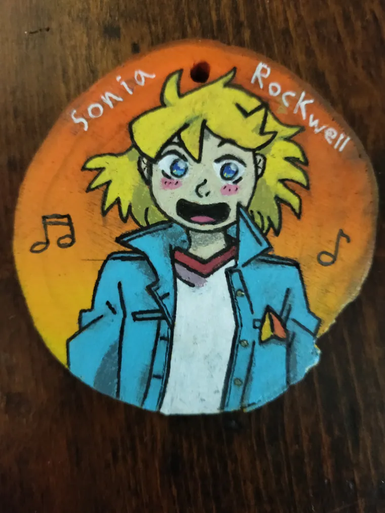 Sonia Rockwell, acrylic on a wood slice.