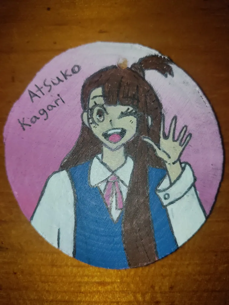 Atsuko Kagari, acrylic on a wood slice.
