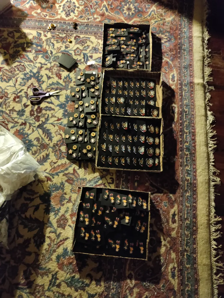 Pin trays sorted for packing.