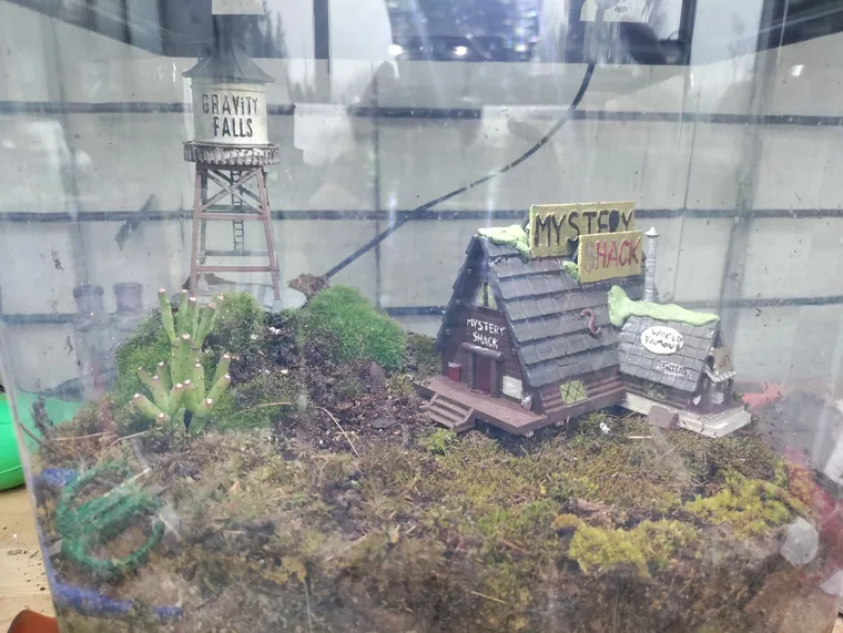 Mystery Shack diorama built into a display case.