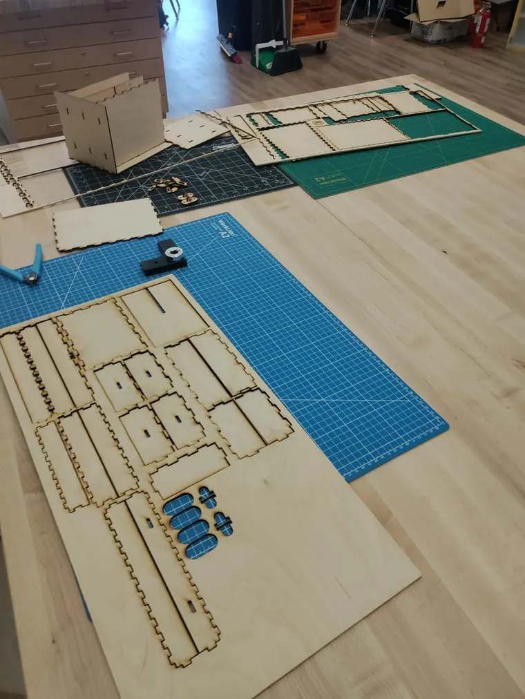 Laser cut plywood parts for a tool chest.